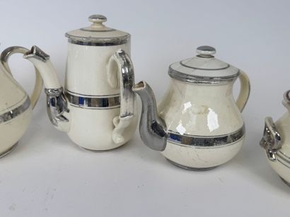LANGEAIS.
Seven pieces in cream and silver...