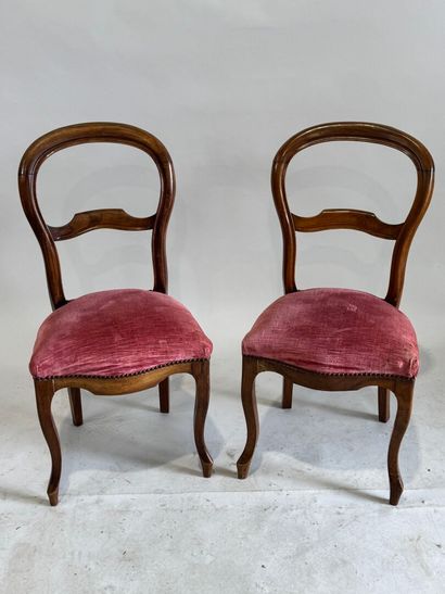 Pair of molded walnut chairs with pink velvet...