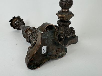 Pair of tripod candlesticks in patinated...