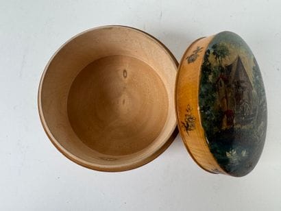 Two boxes comprising :
- a circular wooden...