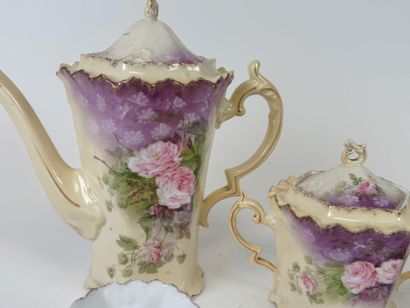 Part of a polychrome and gold porcelain coffee...