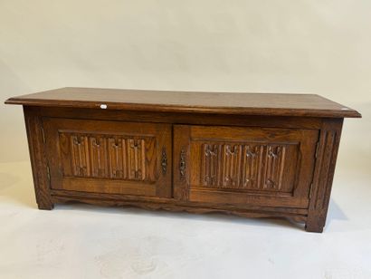 Moulded and carved oak chest opening with...