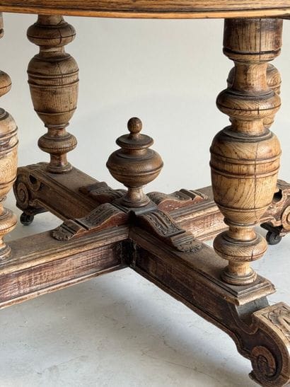 Large molded oak pedestal table on casters.
Henry...