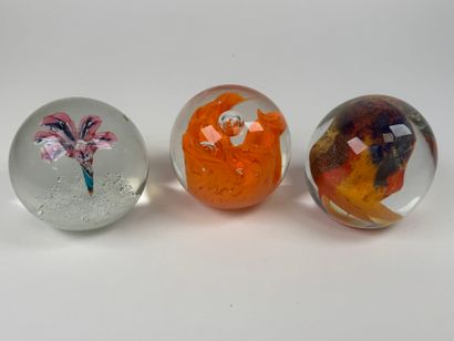 Three sulfur balls or paperweights in colored...