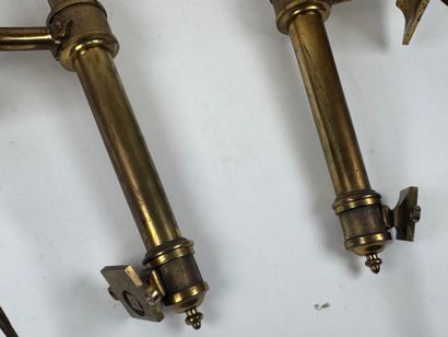 Pair of bronze sconces in the shape of a...