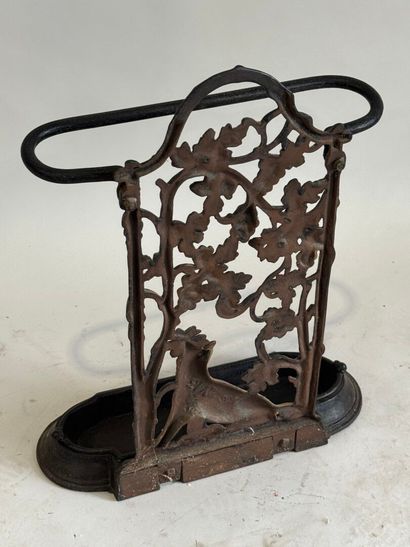 Openwork cast-iron umbrella stand decorated...