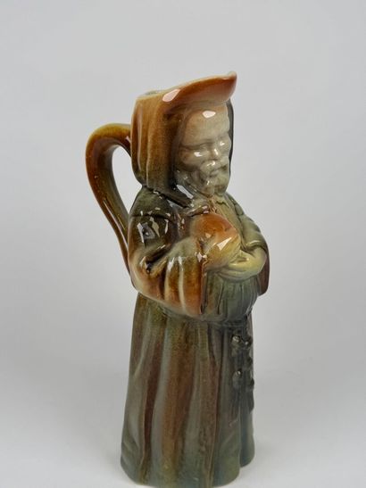 Polychrome earthenware pitcher featuring...