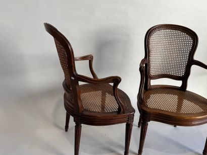Pair of molded and carved wooden armchairs...