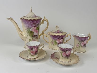 Part of a polychrome and gold porcelain coffee...