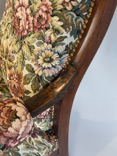 Two mahogany and oak molded and carved armchairs,...
