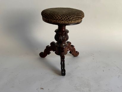 Molded and carved wooden piano stool, circular...