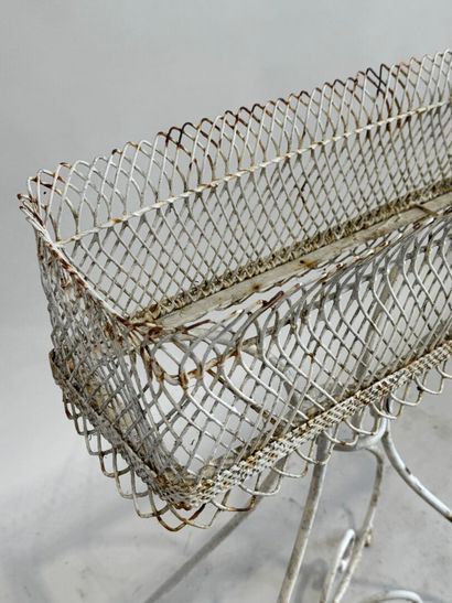 White lacquered metal planter, scrolled base,...
