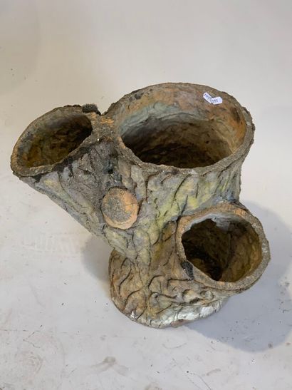 Reconstituted stone planter forming a tree...