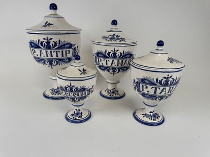 DESVRES.
Four covered medicine jars in blue...