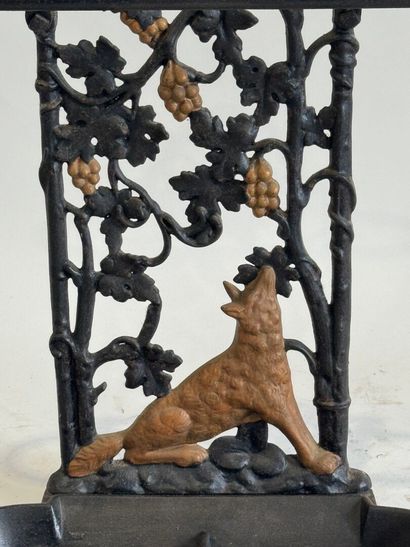 Openwork cast-iron umbrella stand decorated...