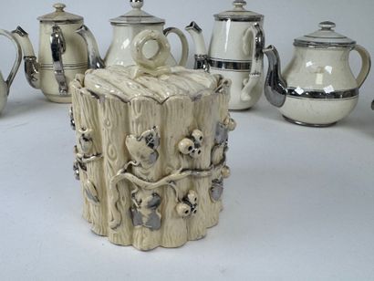 LANGEAIS.
Seven pieces in cream and silver...
