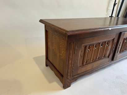 Moulded and carved oak chest opening with...