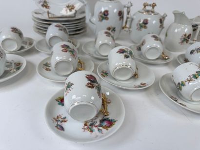 Part of a polychrome and gold porcelain coffee...