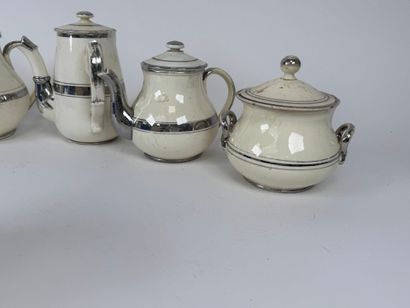 LANGEAIS.
Seven pieces in cream and silver...