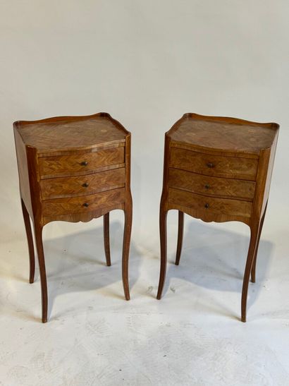 A pair of Louis XV style, molded rosewood...