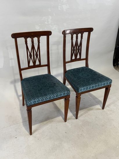 Pair of molded wood chairs with openwork...