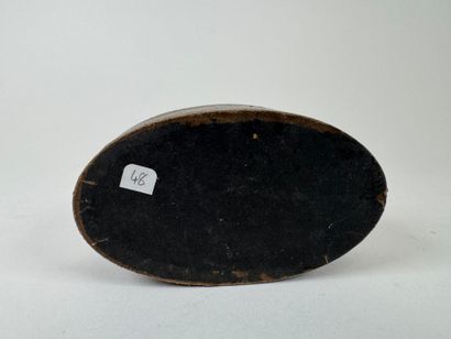 Two boxes comprising :
- a circular wooden...