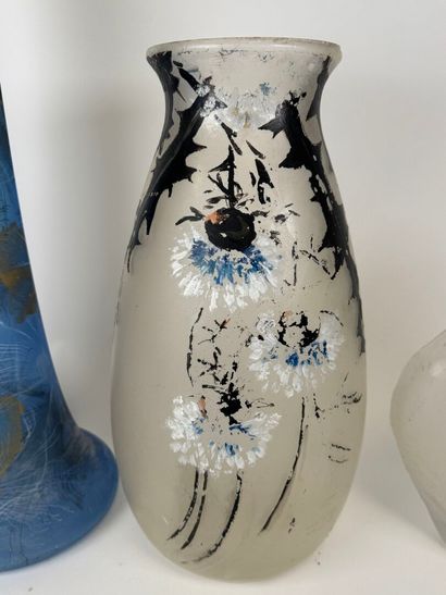Three glass vases, one painted with flowers,...
