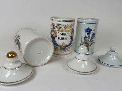 Suite of three enameled porcelain medicine...