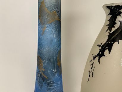 Three glass vases, one painted with flowers,...