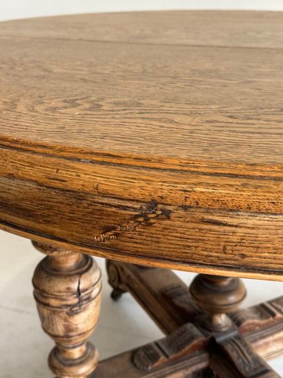Large molded oak pedestal table on casters.
Henry...