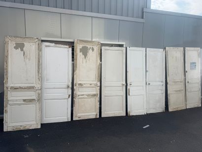 Suite of eight doors in molded and painted...