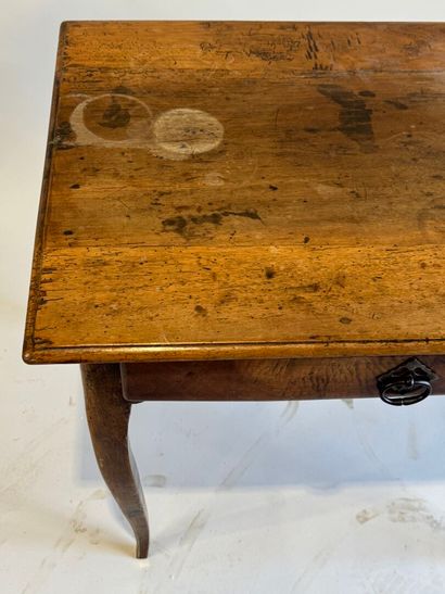 Small rustic table in molded walnut opening...