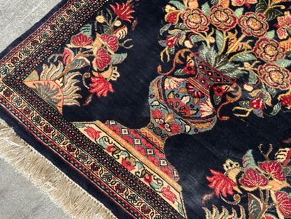 GHOUM.
Handmade silk carpet decorated with...