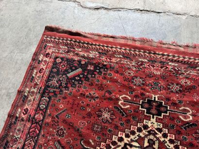 Polychrome wool carpet with stylized motifs...