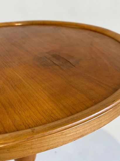 Small circular tripod pedestal table in fruitwood....