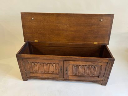 Moulded and carved oak chest opening with...