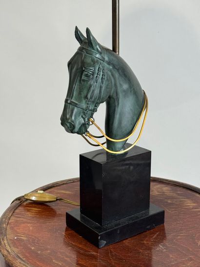 Regula lamp with green patina featuring a...