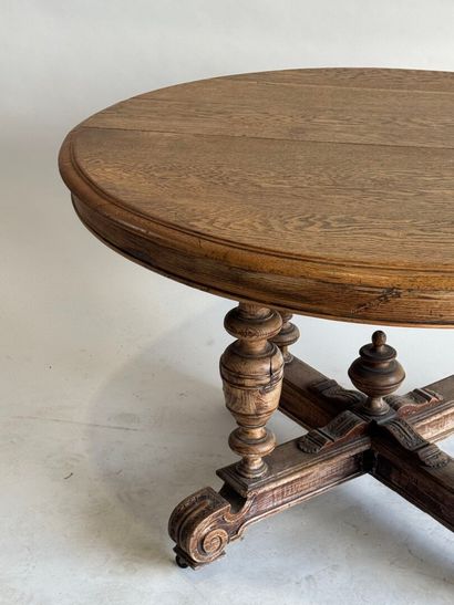 Large molded oak pedestal table on casters.
Henry...