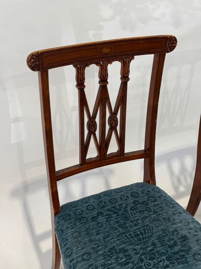 Pair of molded wood chairs with openwork...