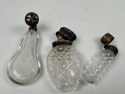 Three crystal and cut-glass salt flasks,...