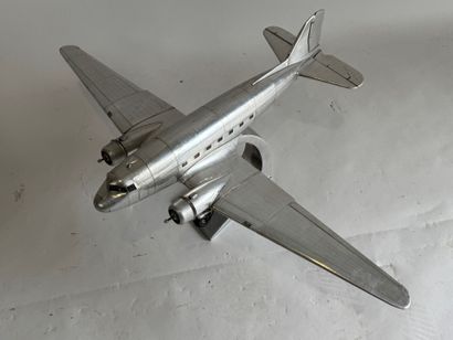 20th century school. 
Douglas DC-3 aircraft....