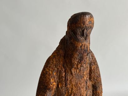 Wooden sculpture of an ecclesiastical figure....