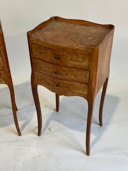 A pair of Louis XV style, molded rosewood...