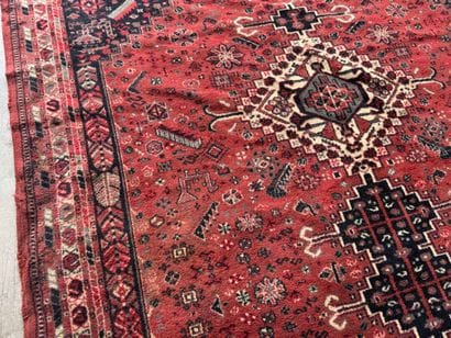 Polychrome wool carpet with stylized motifs...