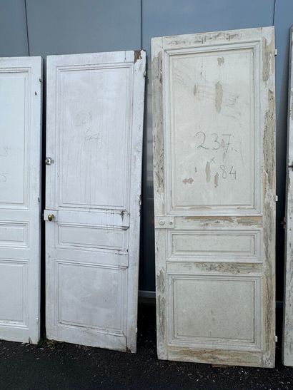 Suite of eight doors in molded and painted...