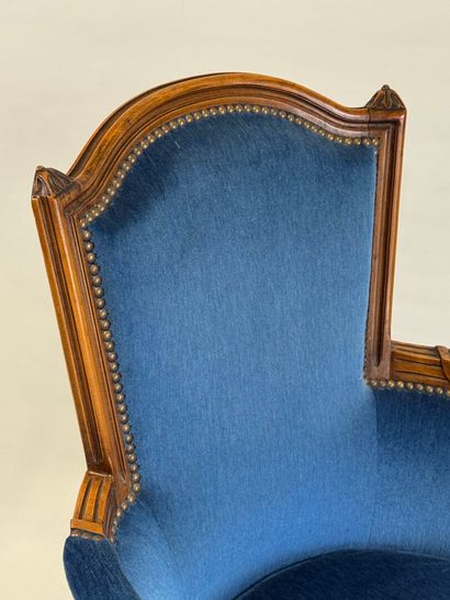 Molded and carved beech armchair, basket-handle...