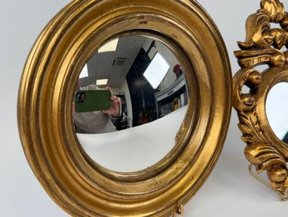 Suite of two mirrors, one of which is a circular...