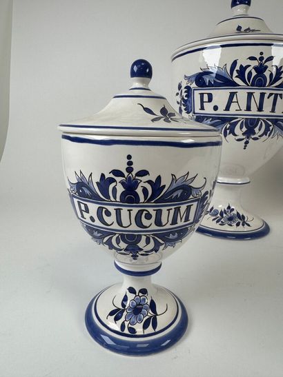 DESVRES.
Four covered medicine jars in blue...