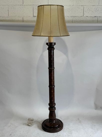 Turned wood floor lamp with gold stylized...