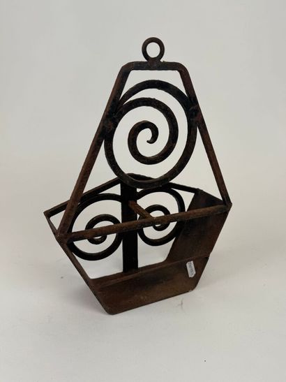 Small wrought-iron wall unit with scroll...